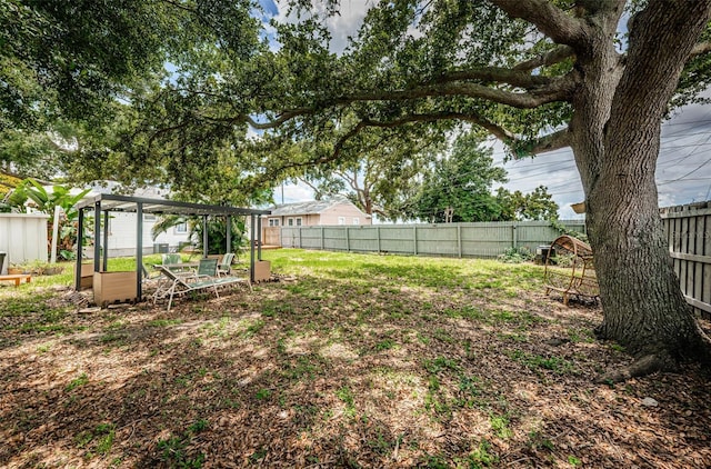 view of yard with a pergola