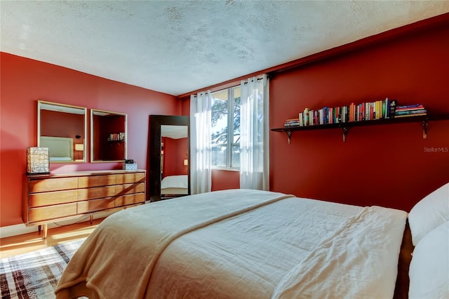 bedroom with a textured ceiling