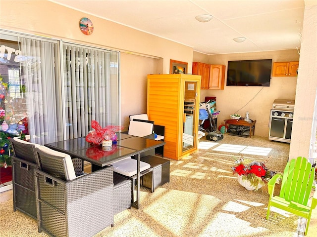 dining room with light colored carpet