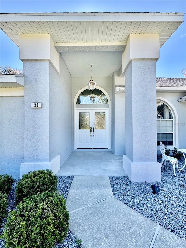 doorway to property with french doors