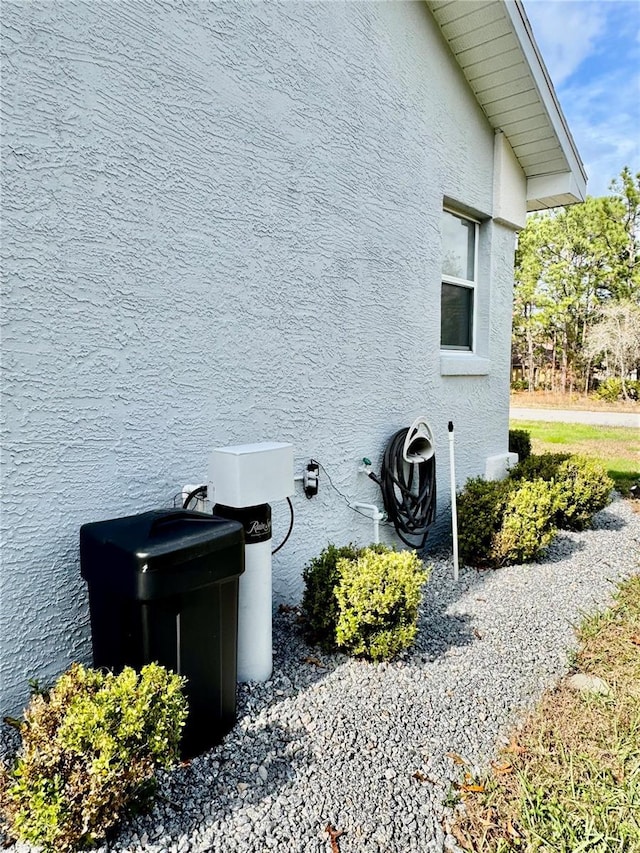 view of property exterior with stucco siding