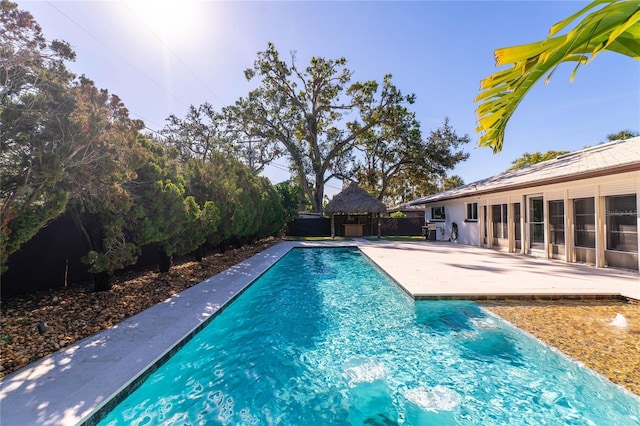 view of swimming pool featuring a patio