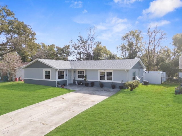 ranch-style home with a front lawn