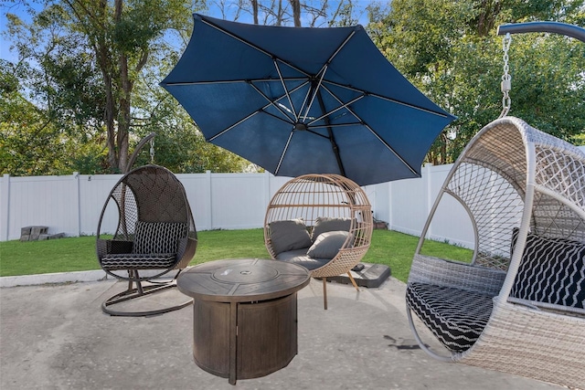 view of patio / terrace featuring an outdoor fire pit