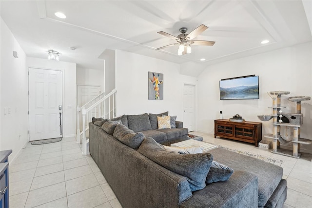 tiled living room with ceiling fan