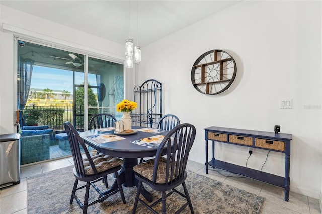 dining area with light tile patterned floors