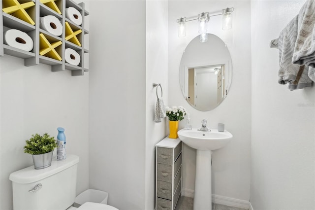 bathroom featuring sink and toilet