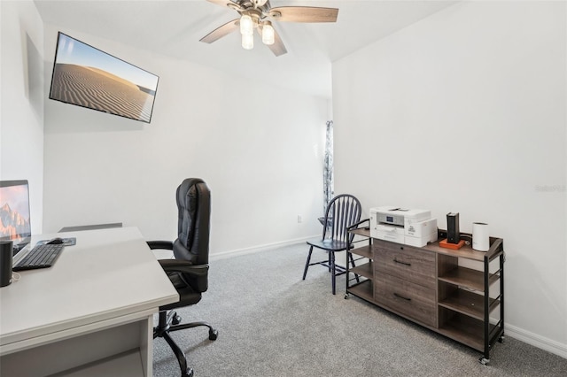 carpeted office with ceiling fan