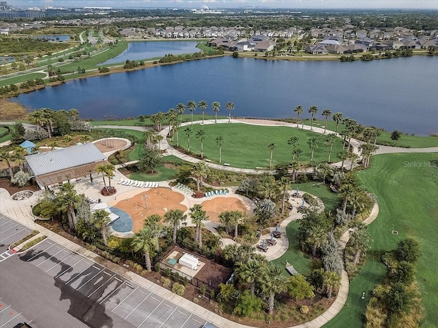 drone / aerial view with a water view