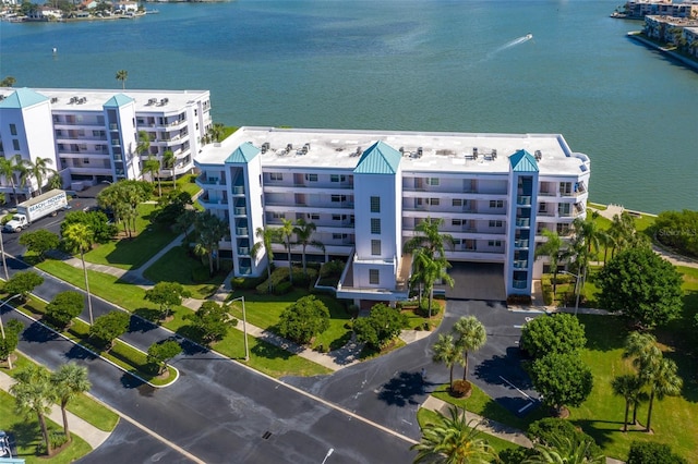 birds eye view of property featuring a water view