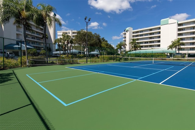 view of tennis court with basketball court