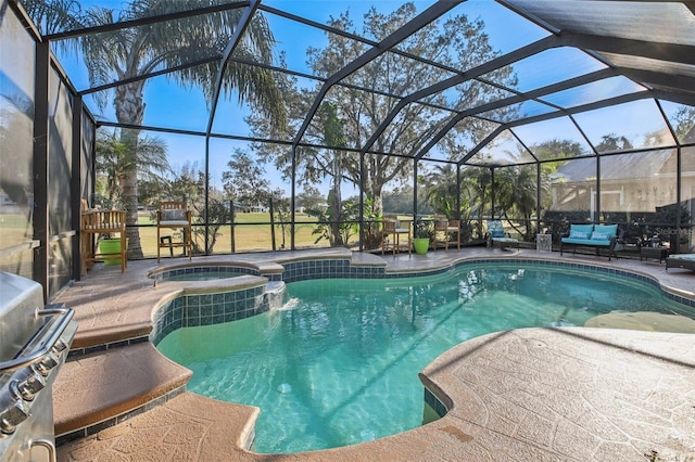 view of pool featuring a lanai, grilling area, a patio, and an in ground hot tub