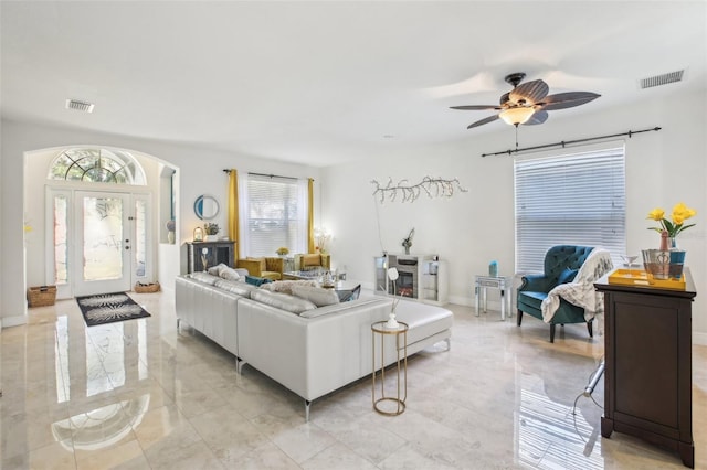 living room featuring ceiling fan