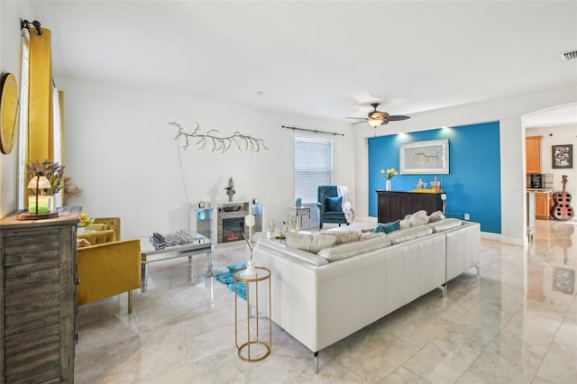 living room featuring ceiling fan