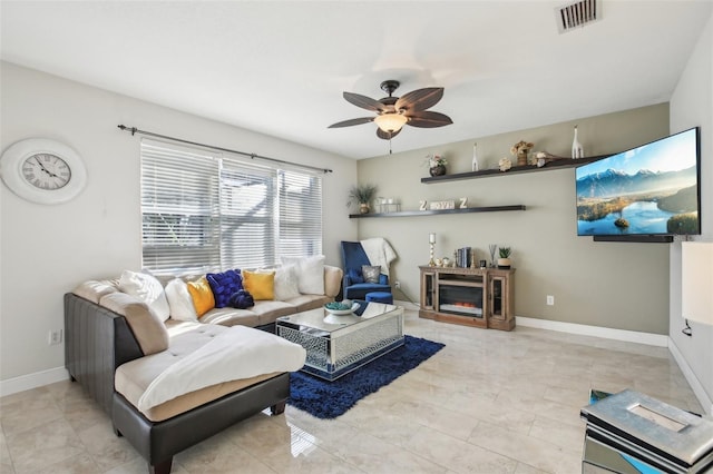 living room featuring ceiling fan