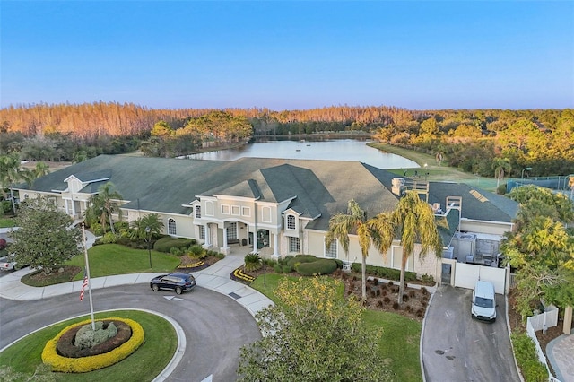 birds eye view of property featuring a water view