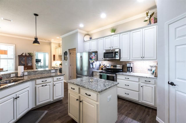 kitchen featuring ornamental molding, stainless steel appliances, tasteful backsplash, and dark wood-type flooring