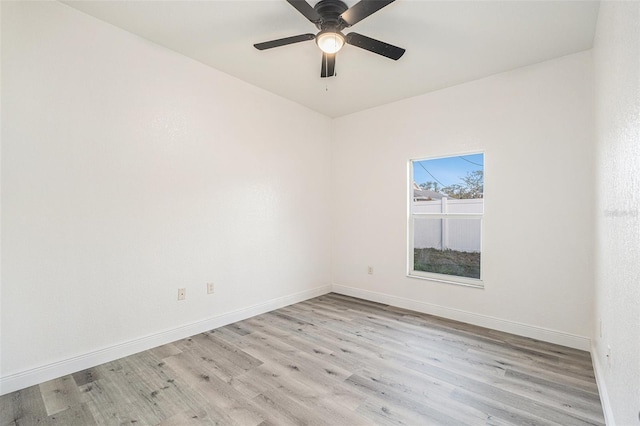 unfurnished room with ceiling fan and light wood-type flooring