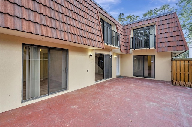 rear view of property with a patio area