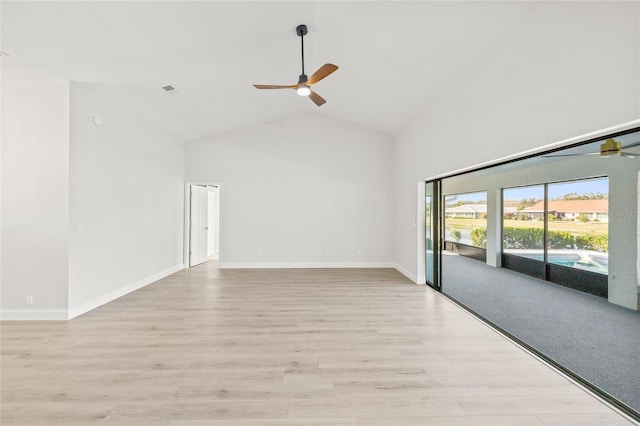 unfurnished living room featuring ceiling fan, high vaulted ceiling, and light hardwood / wood-style flooring