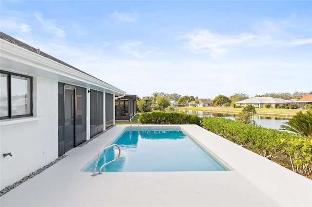 view of pool featuring a sunroom and a water view