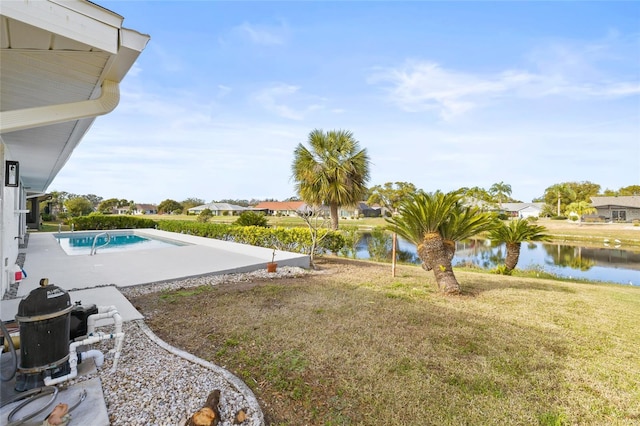 view of yard with a patio and a water view