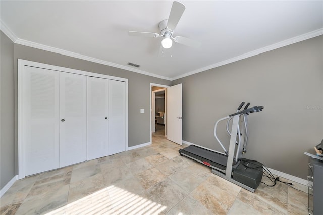 workout area with ceiling fan and crown molding