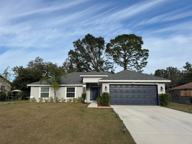 ranch-style home featuring a garage and a front lawn