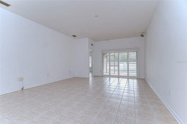 view of tiled spare room