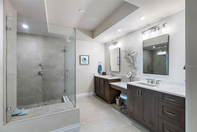 bathroom with vanity and walk in shower