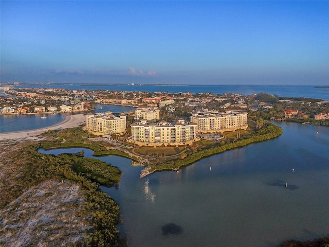 aerial view at dusk with a water view