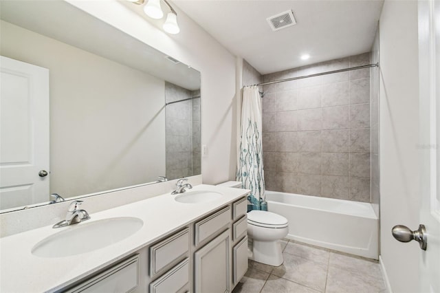 full bathroom featuring toilet, tile patterned floors, shower / bathtub combination with curtain, and vanity