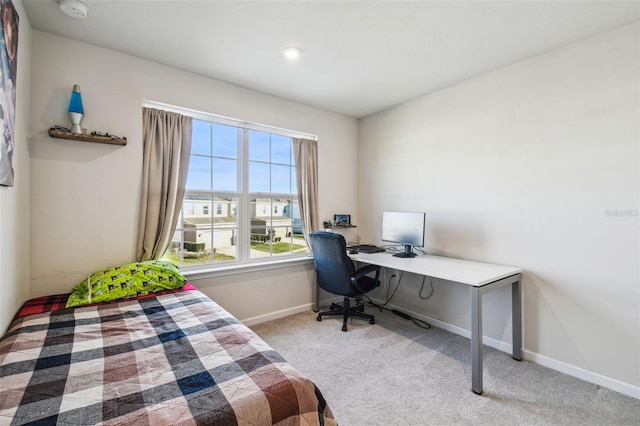 bedroom with light carpet