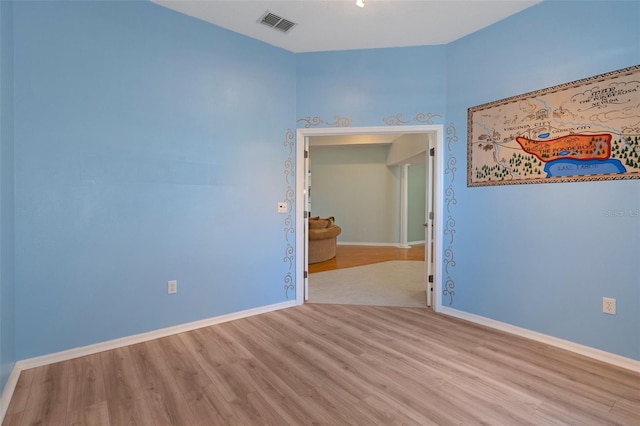 empty room featuring light hardwood / wood-style floors