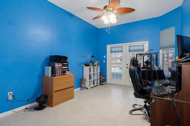 office featuring ceiling fan, a wealth of natural light, and french doors