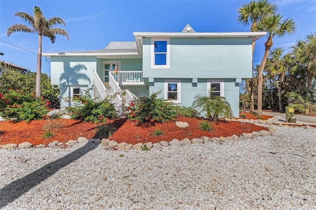 465 Lake Murex Cir, Sanibel, FL 33957 - view of front facade featuring covered porch