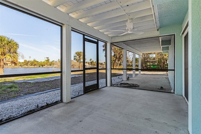 465 Lake Murex Cir, Sanibel, FL 33957 - unfurnished sunroom featuring beam ceiling, a water view, and ceiling fan