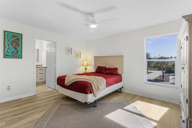 465 Lake Murex Cir, Sanibel, FL 33957 - bedroom featuring ensuite bathroom, ceiling fan, and light hardwood / wood-style floors