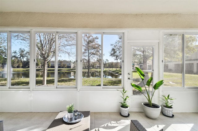 sunroom with a water view