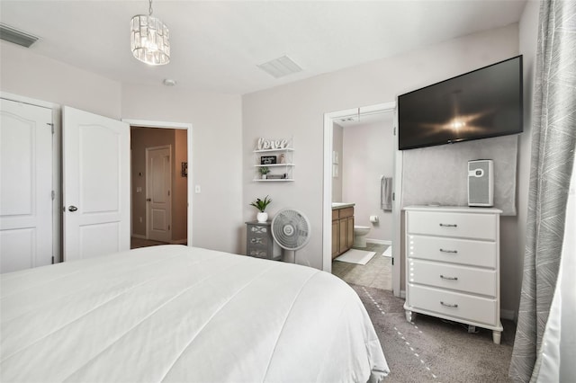 bedroom featuring ensuite bathroom