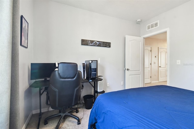 bedroom with light carpet