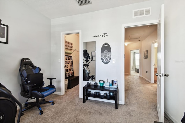 workout area with light colored carpet