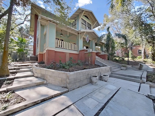 view of property exterior featuring ceiling fan