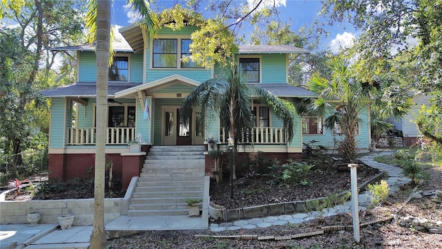 view of front of property featuring covered porch