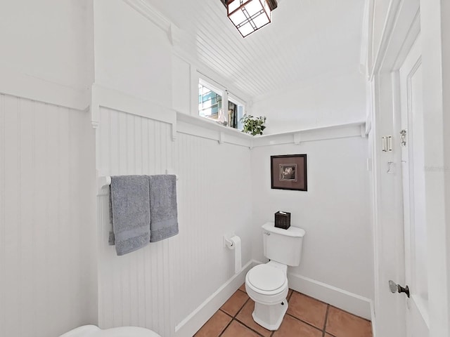 bathroom featuring toilet and tile patterned floors