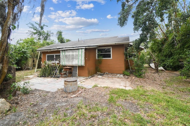 6420 Oelsner St, New Port Richey, FL 34652 - back of house featuring a patio area