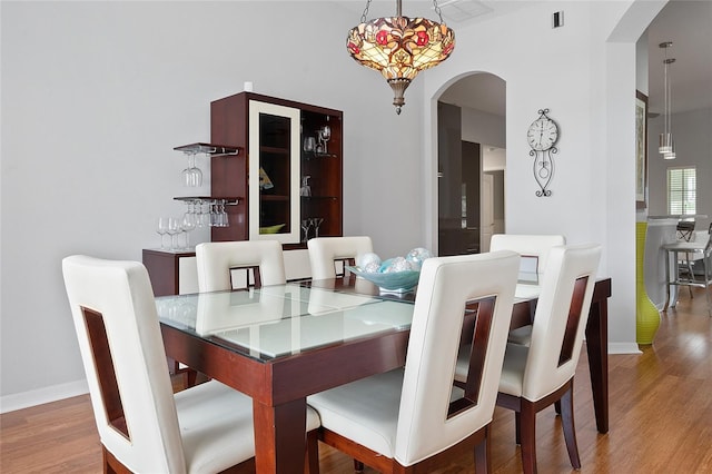 dining room featuring hardwood / wood-style flooring