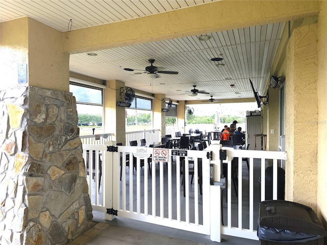 view of patio / terrace featuring ceiling fan