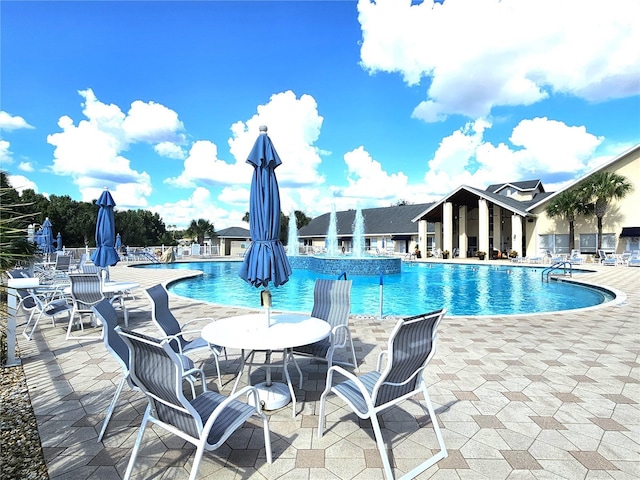 view of pool with a patio area