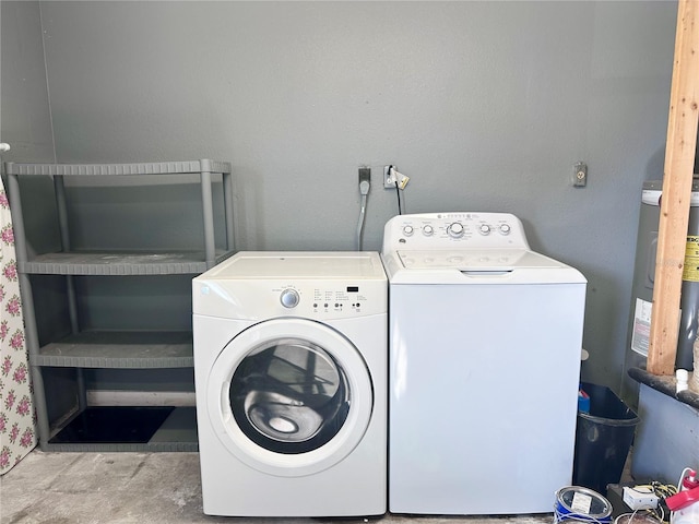 clothes washing area featuring washing machine and clothes dryer